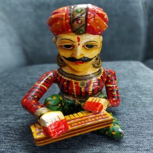 Wooden hand made ceramic musician